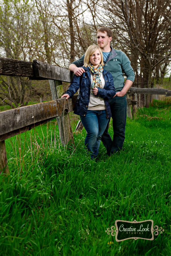 rustic-fence-engagement-photo