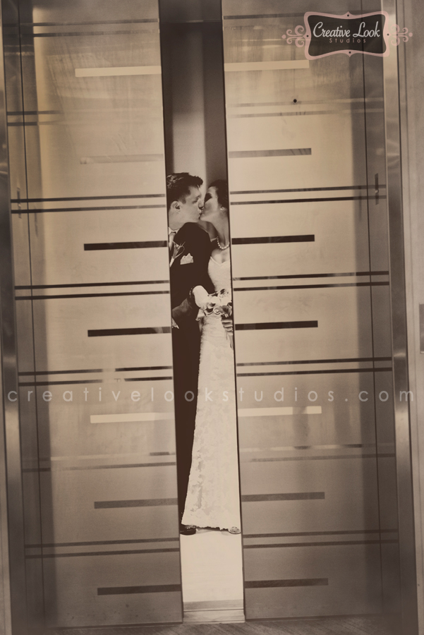bride-and-groom-in-elevator-overture-center-wi