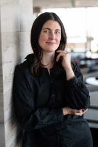 Professional headshot of a Madison business owner on locatio