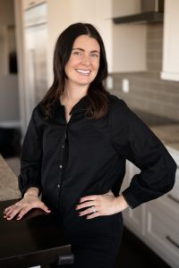 Environmental headshot of a Madison realtor showcasing a modern style