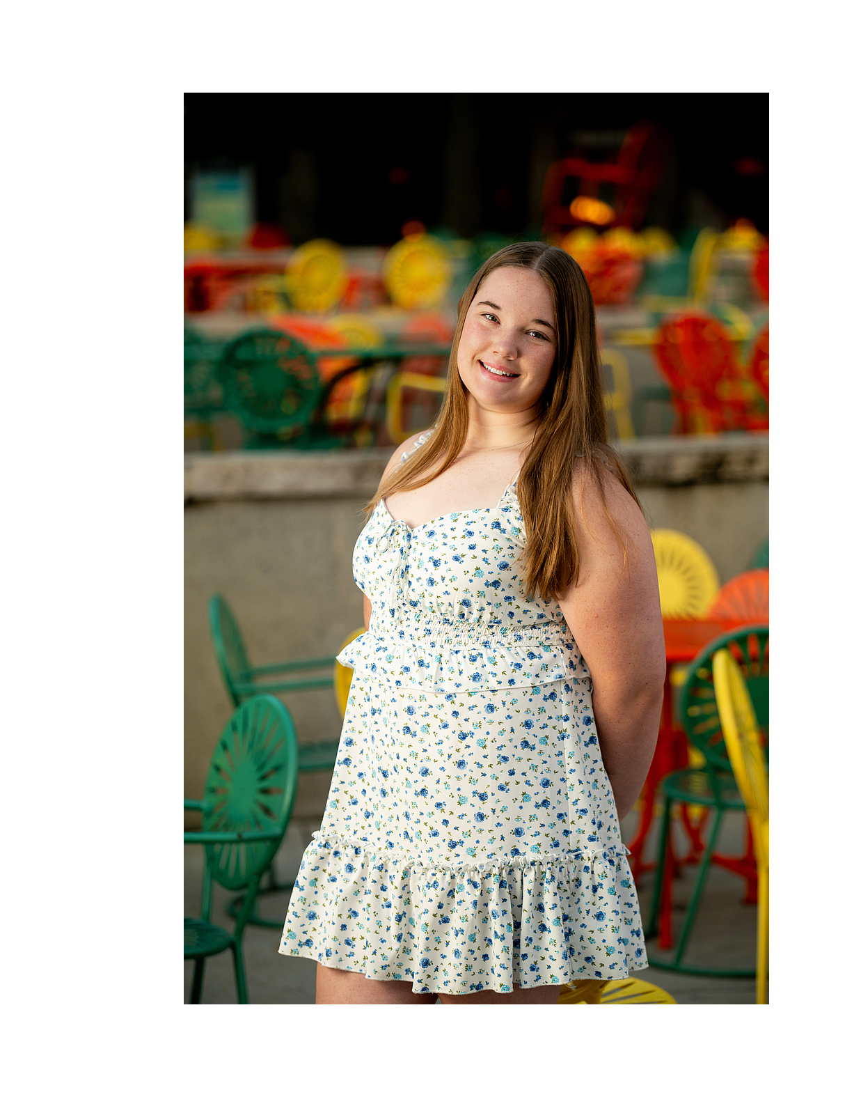 Girl laughing during golden hour senior photo session in Middleton WI
