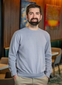 Business headshot with office background at RSM Madison WI