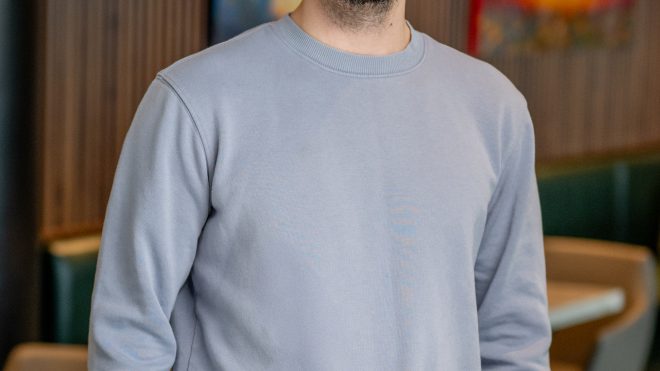 Business headshot with office background at RSM Madison WI