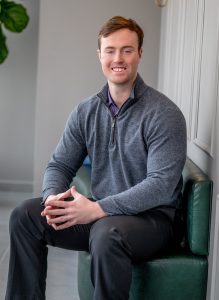 Professional headshot using office space at RSM Madison